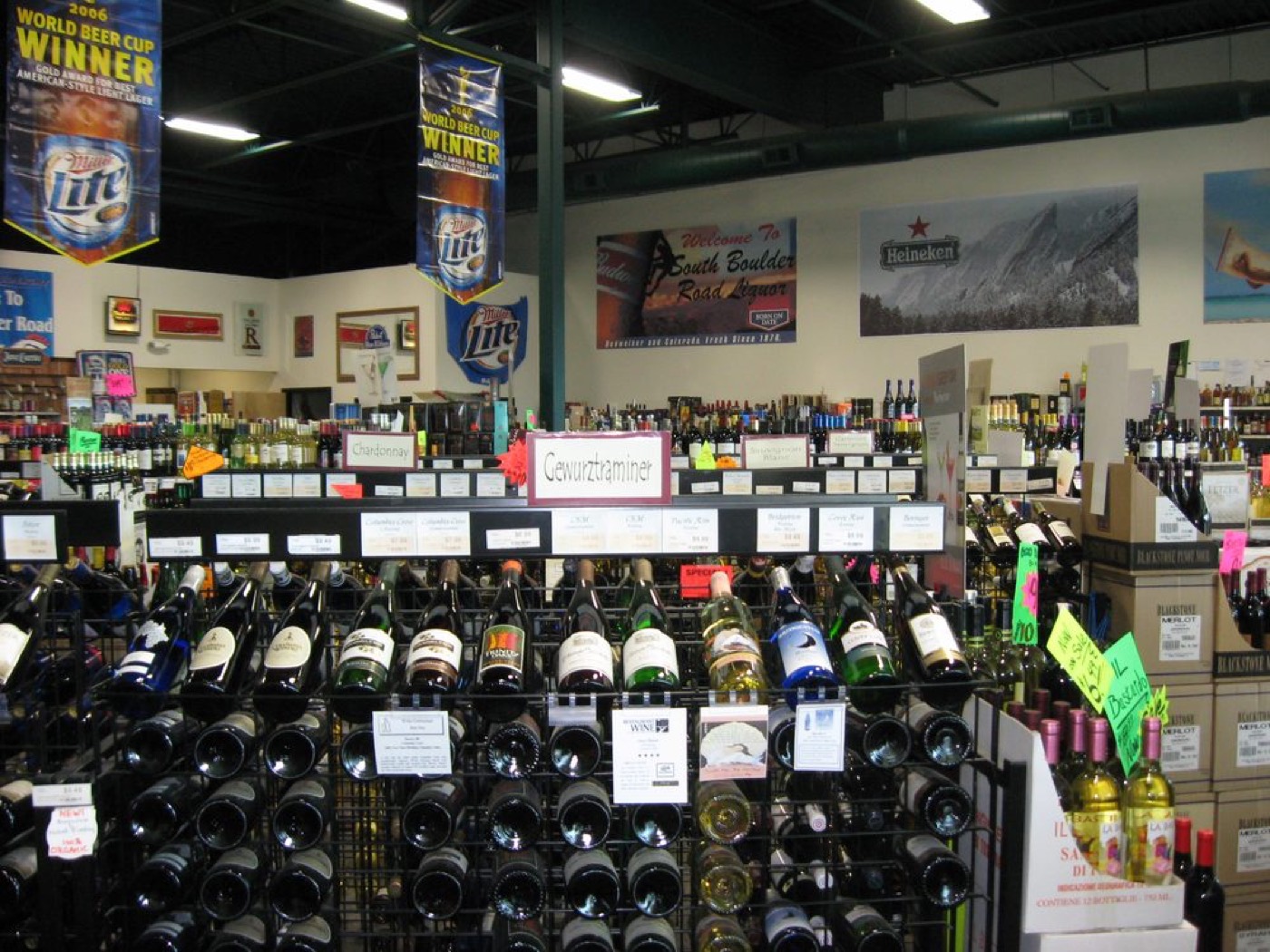 Wine racks and the spirits wall inside the store